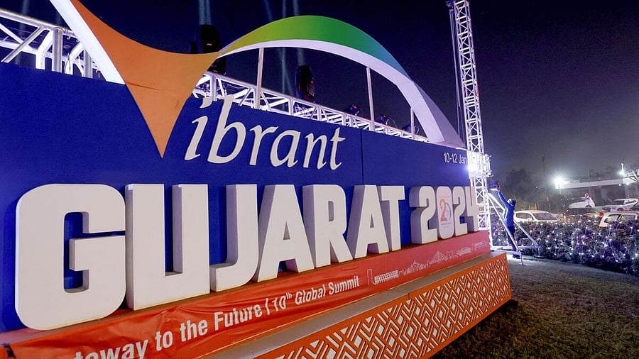 <div class="paragraphs"><p>A worker installs lights ahead of the Vibrant Gujarat Global Summit, in Ahmedabad.&nbsp;</p></div>