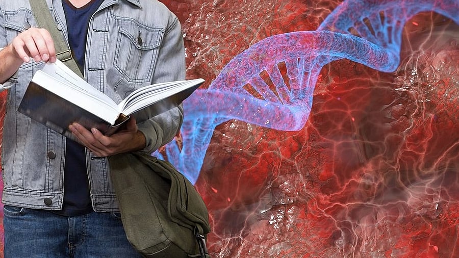<div class="paragraphs"><p>Representative image showing a person reading a book with chromosomes in the background. </p></div>