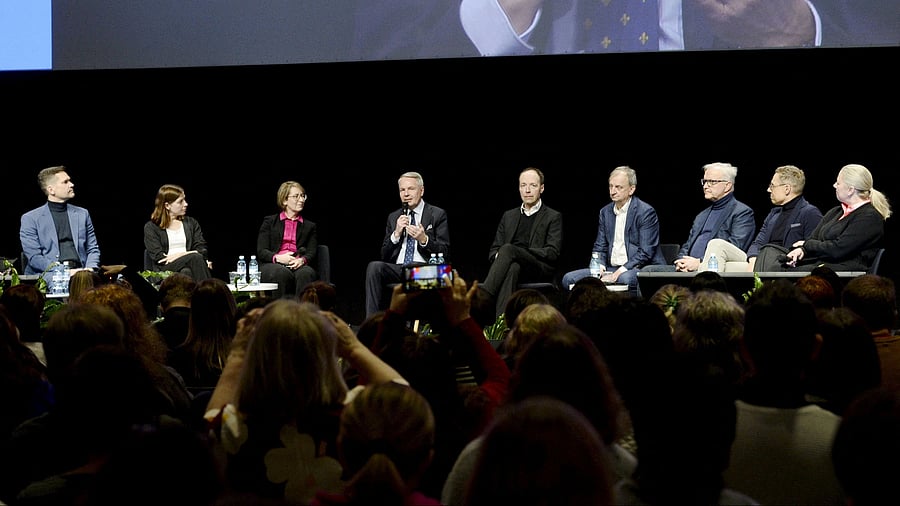 <div class="paragraphs"><p>Presidential candidates attend a presidential election debate in Finland.</p></div>