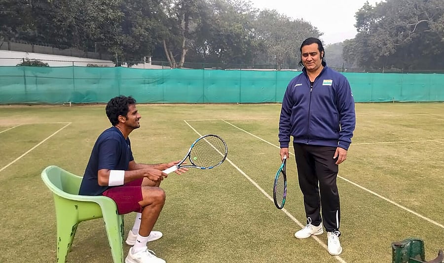 <div class="paragraphs"><p>Indian Davis Cup team captain Rohit Rajpal with doubles player Saketh Myneni during a practice session ahead of a tie against Pakistan, in New Delhi.</p></div>