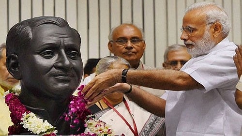 <div class="paragraphs"><p>File photo of Prime Minister Narendra Modi paying tribute to Pandit Deendayal Upadhyaya.</p></div>