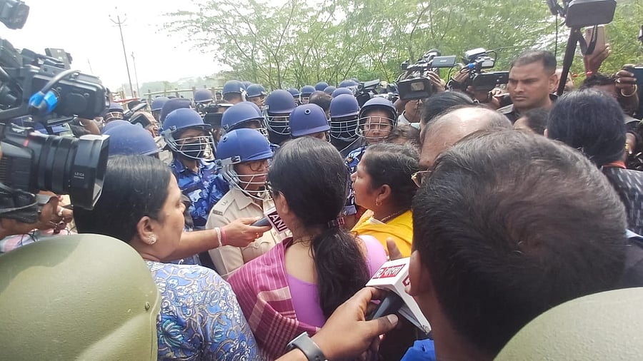 <div class="paragraphs"><p>Union Minister Annapurna Devi along with BJP's Protima Bhoumik being stopped by forces from entering Sandeshkhali in the North 24 Parganas of West Bengal on Friday, February 16, 2024.</p></div>
