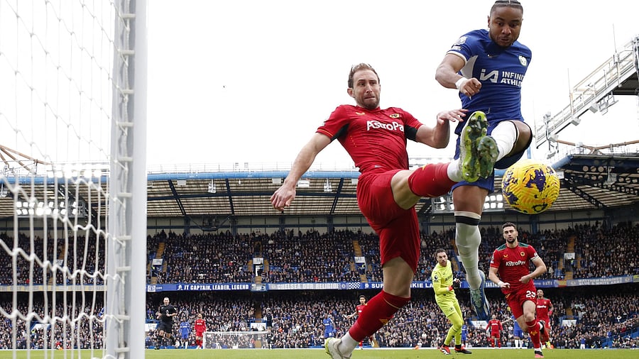 <div class="paragraphs"><p>Soccer Football - Premier League - Chelsea v Wolverhampton Wanderers - Stamford Bridge, London, Britain - February 4, 2024 Wolverhampton Wanderers' Craig Dawson in action with Chelsea's Christopher Nkunku Action  </p></div>