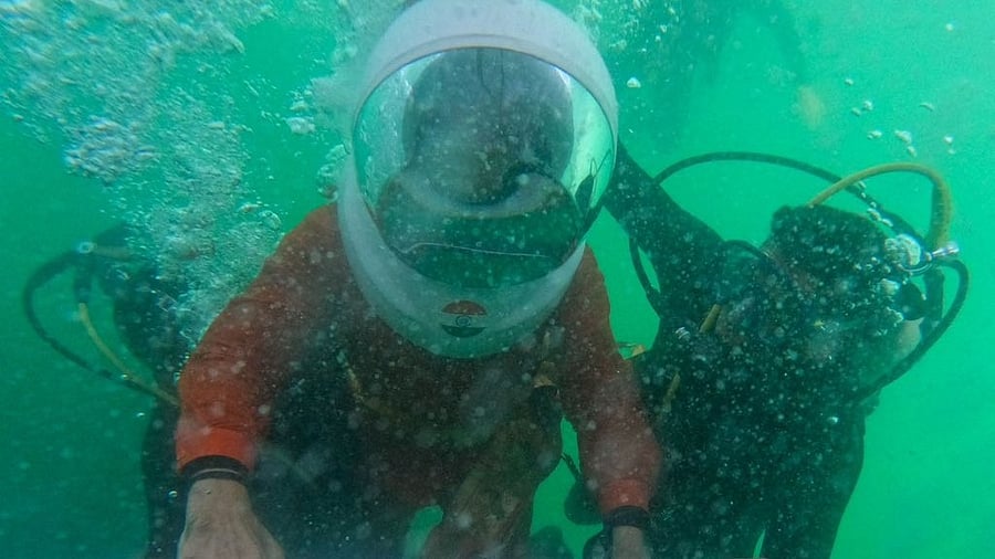 <div class="paragraphs"><p>Scuba diving is conducted off the coast of Dwarka near Beyt Dwarka island, where people can see the underwater remains of ancient Dwarka that were excavated by archaeologists.</p></div>