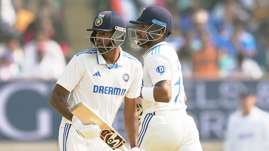 <div class="paragraphs"><p>Dhruv Jurel and Ravichandran Ashwin run between the wickets during the second day of the 3rd cricket Test match between India and England, at Niranjan Shah Stadium, in Rajkot, Friday, February 16, 2024.</p></div>