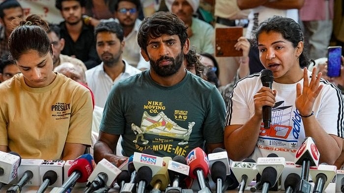 <div class="paragraphs"><p>Wrestlers Bajrang Punia, Vinesh Phogat and Sakshi Malik.</p></div>