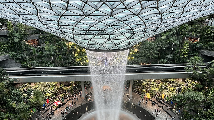 <div class="paragraphs"><p>The rain vortex cascades down seven storeys in the airport mall, Jewel.</p></div>