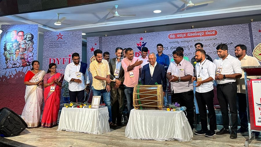 <div class="paragraphs"><p>Retired High Court judge Justice H N Nagamohan Das inaugurates&nbsp; 12th DYFI Karnataka state conference by beating Dolu at the Unity hall in Thokkottu. </p></div>