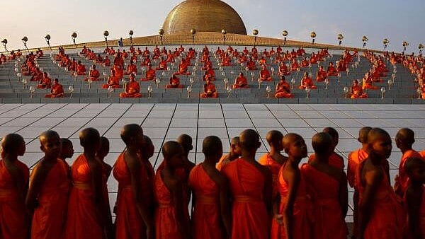 <div class="paragraphs"><p>Buddhist monks pray at the Wat Phra Dhammakaya temple during a ceremony commemorating Makha Bucha Day in Pathum Thani province outside Bangkok, Thailand, February 24, 2024.</p></div>