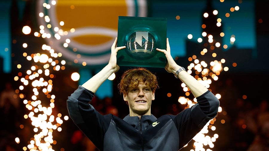 <div class="paragraphs"><p>Jannik Sinner celebrates with the Rotterdam Open trophy </p></div>