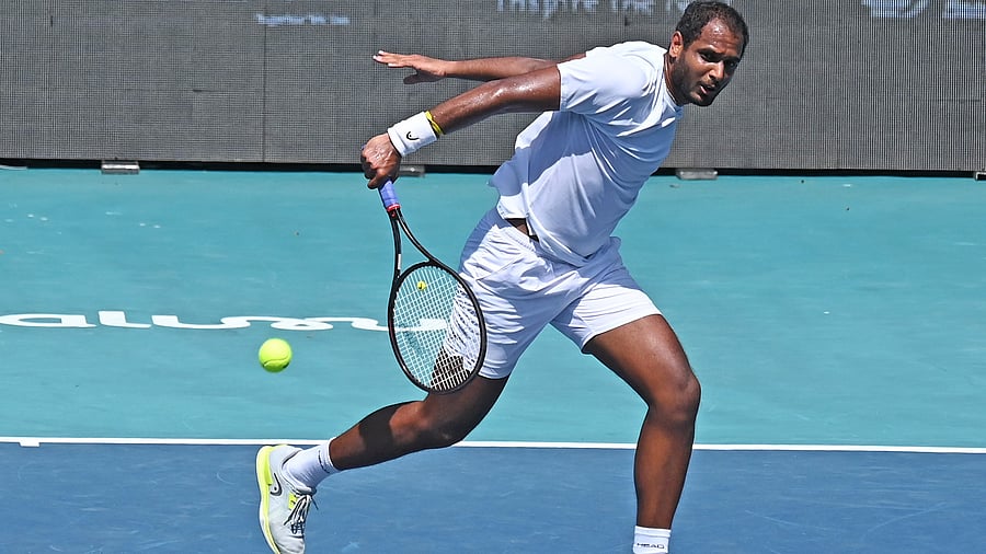 <div class="paragraphs"><p>India's Ramkumar Ramanathan returns during his win over Italy's Luca Nardi on Wednesday. </p></div>