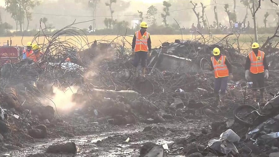 <div class="paragraphs"><p>Rescue officials at the site of the firecrackers factory where an explosion and subsequent blaze on Tuesday killed at least 11 people and injured 174 others, in Harda district, Wednesday, Feb. 7, 2024. </p></div>