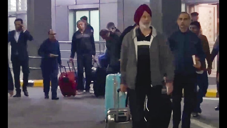 <div class="paragraphs"><p>Former Indian naval personnel, who were jailed and handed down death sentences in a case of suspected espionage in Qatar, arrive in India following their release, in New Delhi.</p></div>