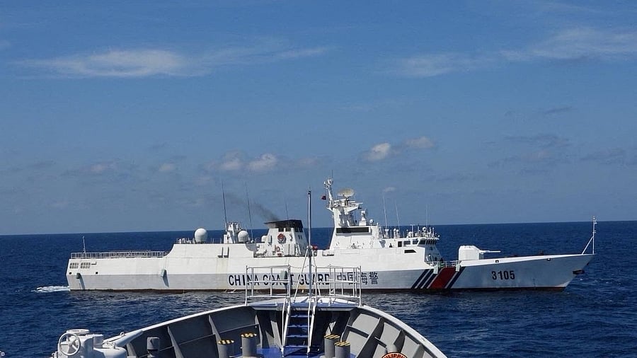 <div class="paragraphs"><p>A China Coast Guard vessel manoeuvres near Philippine Coast Guard vessel BRP Teresa Magbanua near Scarborough Shoal in the South China Sea, Philippines, February 8, 2024.  </p></div>