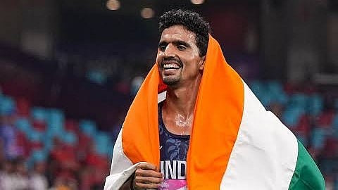 <div class="paragraphs"><p>Gulveer Singh is all smiles after his gold medal winning effort. </p></div>