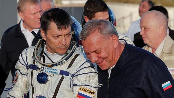 <div class="paragraphs"><p>Cosmonaut Oleg Kononenko seen here with Russian space agency Roscosmos chief Yuri Borisov. </p></div>