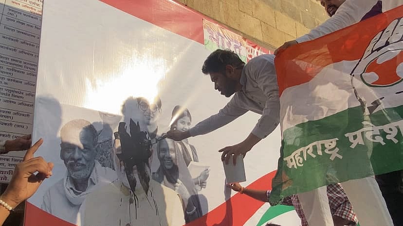 <div class="paragraphs"><p>Kunal Raut  defacing PM’s poster</p></div>