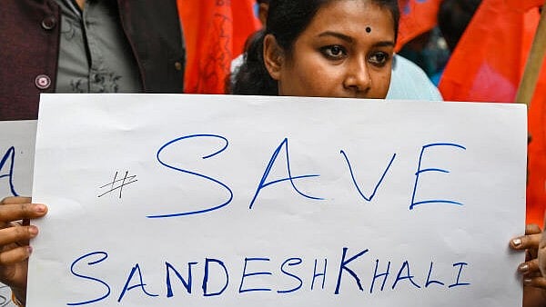 <div class="paragraphs"><p>People participate in a protest rally over the Sandeshkhali incident, in Kolkata.</p></div>