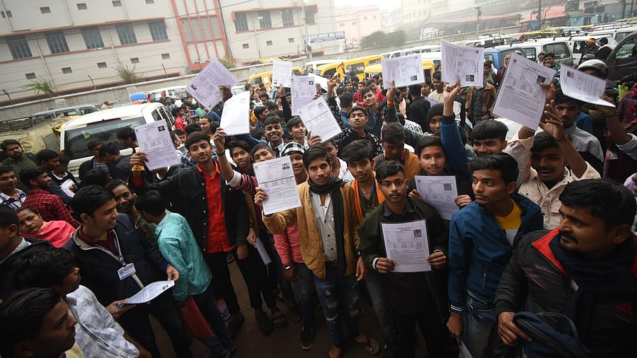 <div class="paragraphs"><p>Patna: Students show their documents before appearing in the Bihar Board's class 12 exams, in Patna, </p></div>