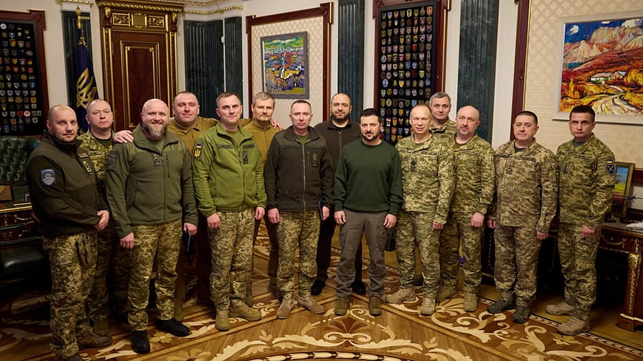 <div class="paragraphs"><p>Ukraine's President Volodymyr Zelenskyy poses for a picture with Commander in Chief of the Ukrainian Armed Forces Colonel General Oleksandr Syrskyi, Defence Minister Rustem Umerov and newly appointed top military commanders after a meeting, amid Russia's attack on Ukraine, in Kyiv, Ukraine February 10, 2024.</p></div>