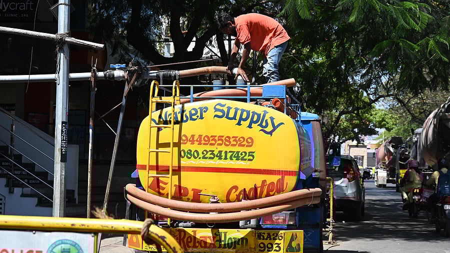 <div class="paragraphs"><p>A water tanker at RMV 2nd stage being filled from a borewell. Pic for representation/ </p></div>