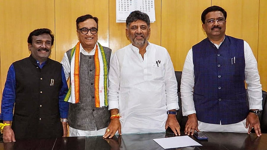 <div class="paragraphs"><p>File Photo: Karnataka Deputy CM D K Shivakumar with Congress candidates  G C Chandrashekhar, Ajay Maken and Syed Naseer Hussain, earlier today in Bengaluru. </p></div>