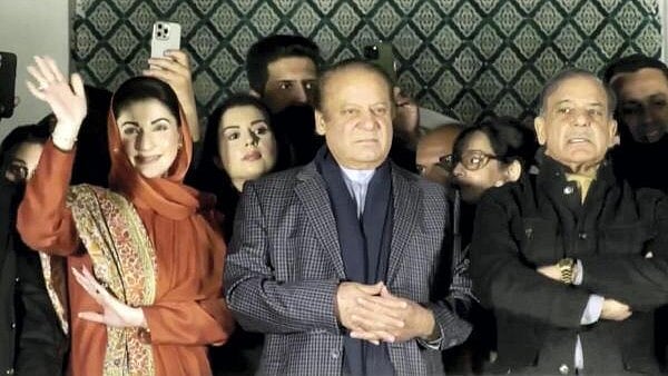 <div class="paragraphs"><p>Former Pakistan prime minister Nawaz Sharif addresses Pakistan Muslim League-Nawaz (PML-N) supporters following the initial results of the country's general elections, in Lahore, Pakistan, Friday, February 9, 2024</p></div>
