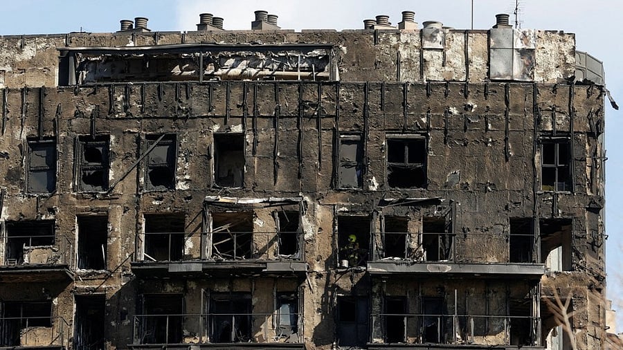 <div class="paragraphs"><p>A firefighter works at the scene of a fire on an apartment building in Valencia, Spain, February 23, 2024.</p></div>