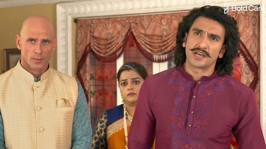 <div class="paragraphs"><p>Ranveer Singh and&nbsp;Johnny Sins in Bold Care commercial.</p></div>
