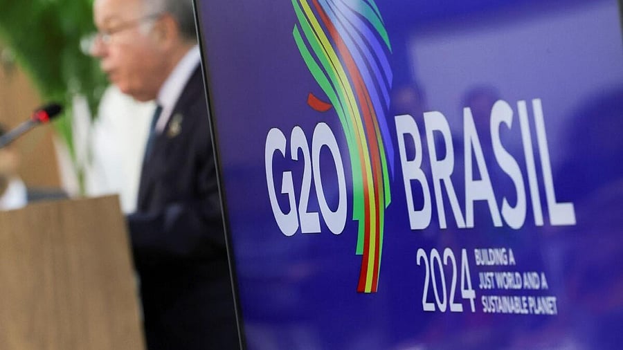 <div class="paragraphs"><p>A logo of G20 is displayed as Brazilian Foreign Minister Mauro Vieira speaks during a press conference following the G20 Foreign Ministers' Meeting, in Rio de Janeiro. </p></div>