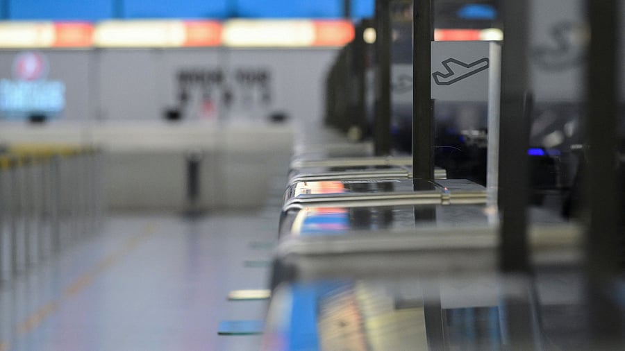 <div class="paragraphs"><p>A view of empty airport security.</p></div>