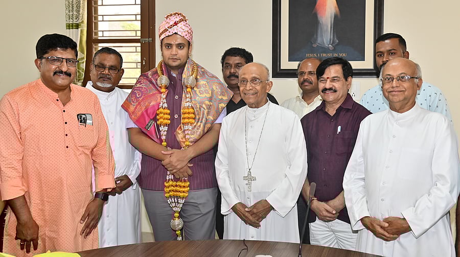 <div class="paragraphs"><p>Archbishop Bernard Moras felicitates BJP Mysore-Kodagu Lok Sabha constituency candidate Yaduveer Krishnadatta Chamaraja Wadiyar, in Mysuru on Monday. BJP leader Dr Anil Thomas, James Dominic, Alfred John and former minister S A Ramadass are seen. </p></div>