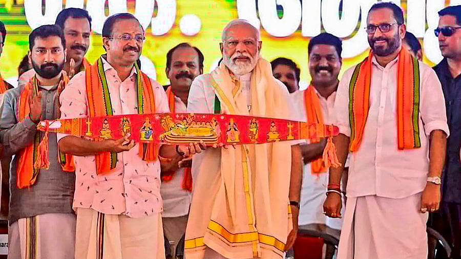 <div class="paragraphs"><p>File photo of&nbsp;Prime Minister Narendra Modi being presented the traditional Onavillu  during a public meeting in Kerala's Pathanamthitta.</p></div>