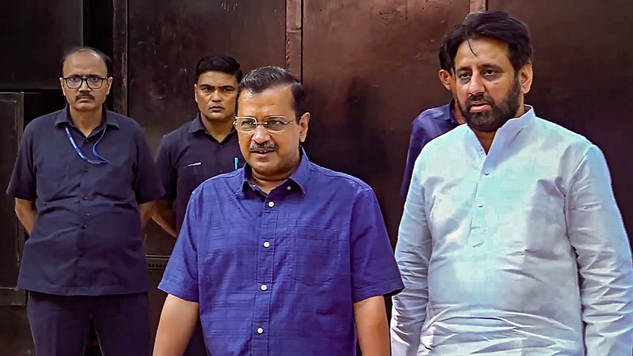 <div class="paragraphs"><p>A file photo of&nbsp;Delhi Chief Minister Arvind Kejriwal with AAP MLA Amanatullah Khan.</p></div>