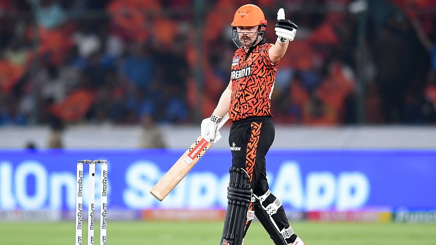 <div class="paragraphs"><p>Sunrisers Hyderabad's Travis Head celebrates after scoring a half-century on Wednesday.</p></div>