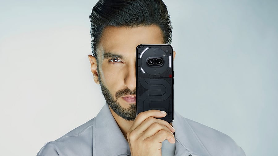 <div class="paragraphs"><p>Brand ambassador Ranveer Singh with Nothing Phone 2(a).</p></div>