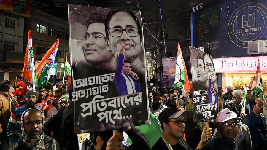 <div class="paragraphs"><p>Trinamool Congress supporters participate in a rally.</p></div>