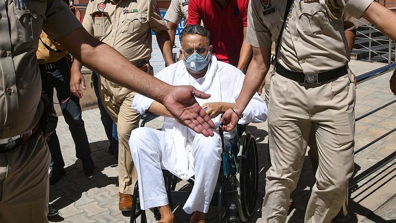 <div class="paragraphs"><p>A file image of&nbsp;Mukhtar Ansari being produced in a Mohali court on March 31, 2021.</p></div>