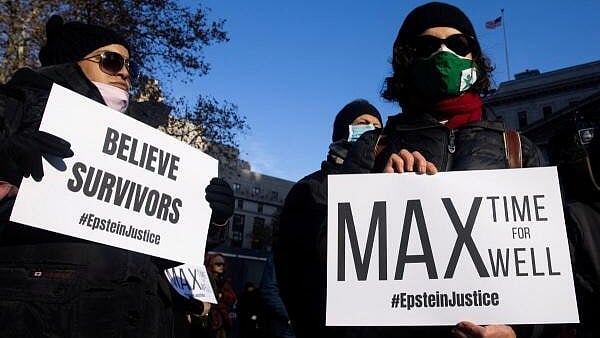 <div class="paragraphs"><p>Protestors hold placards during a rally for survivors of Jeffrey Epstein, in New York City, New York, U.S., December 4, 2021. </p></div>
