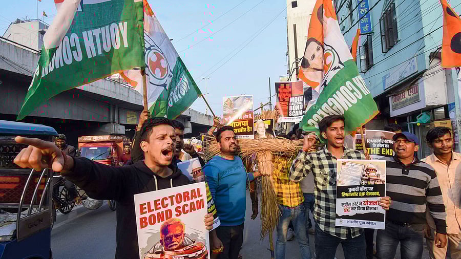 <div class="paragraphs"><p>Youth Congress activists raise slogans during a protest against BJP over an alleged electoral bond scam, in Patna.</p></div>