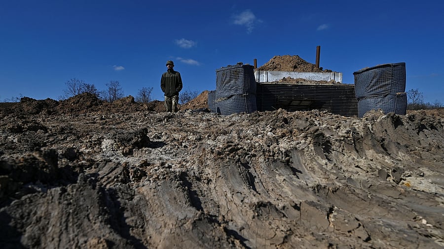 <div class="paragraphs"><p>Danylo, commander of an engineering and sapper company of the Ukrainian Armed Forces, stands next to a concrete dugout built as part of a system of new fortifications, amid Russia's attack on Ukraine, in Zaporizhzhia region, Ukraine March 11, 2024. </p></div>