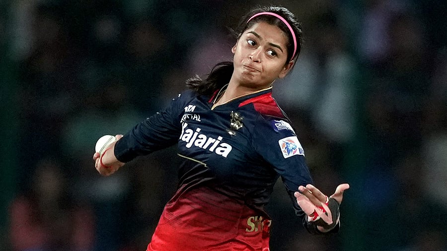 <div class="paragraphs"><p>RCB's Shreyanka Patil bowls during the WPL-T20 final cricket match between Delhi Capitals and Royal Challengers Bangalore at the Arun Jaitley Stadium, in New Delhi, on Sunday.</p></div>