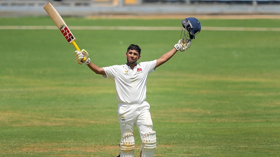<div class="paragraphs"><p>Musheer Khan celebrates after completing his century. </p></div>