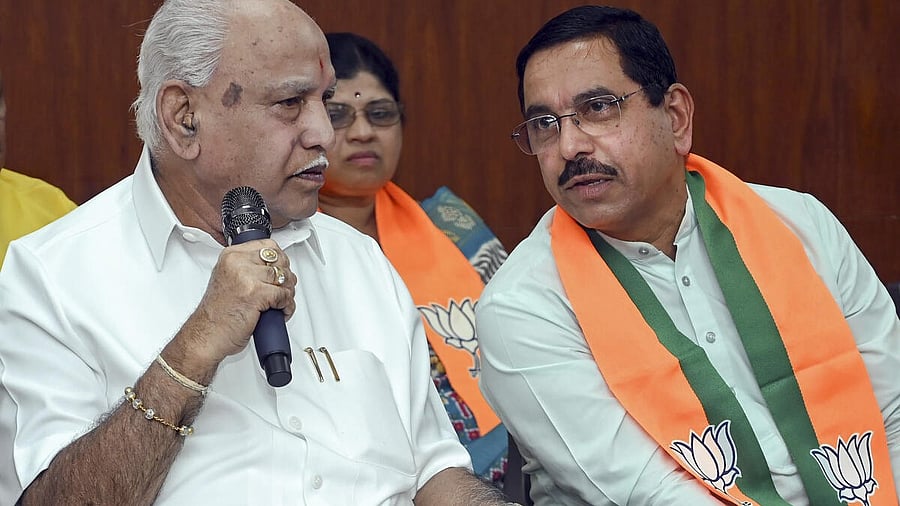 <div class="paragraphs"><p>Former Karnataka Chief Minister BS Yediyurappa with Union Minister Pralhad Joshi.</p></div>
