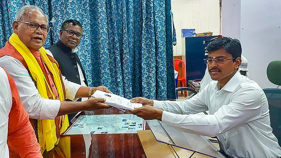 <div class="paragraphs"><p>Hindustani Awam Morcha (HAM) and National Democratic Alliance (NDA) candidate Jitan Ram Manjhi files his nomination papers for upcoming Lok Sabha elections, in Gaya, Thursday, March 28, 2024. </p></div>