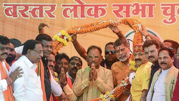 <div class="paragraphs"><p>Chhattisgarh Chief Minister Vishnu Deo Sai being garlanded during a public meeting ahead of Lok Sabha elections, in Bakaband tehsil, in Bastar district.</p></div>
