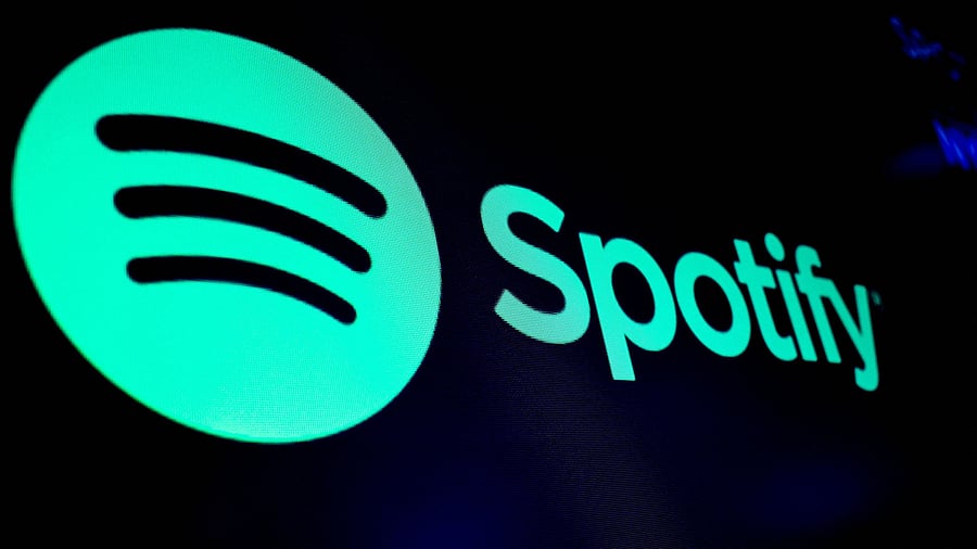 <div class="paragraphs"><p>A screen displays the logo of Spotify </p></div>
