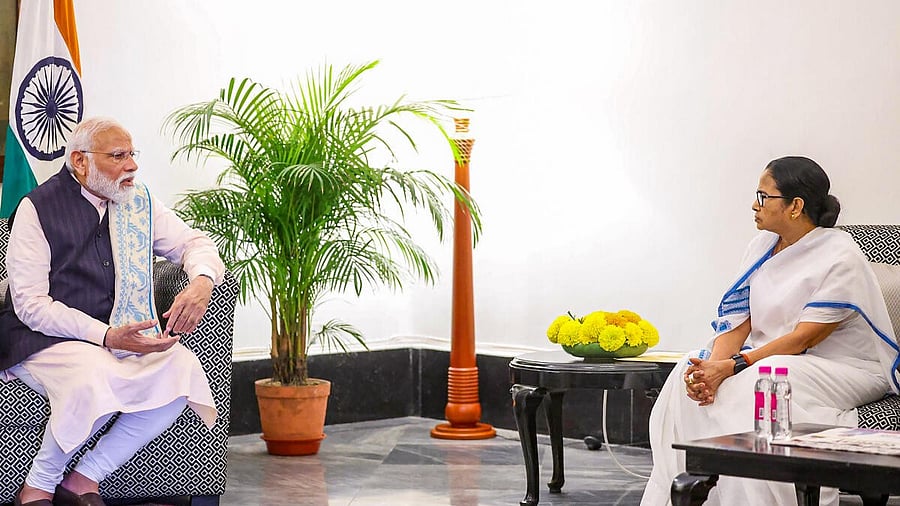 <div class="paragraphs"><p>Prime Minister Narendra Modi with West Bengal Chief Minister Mamata Banerjee during a meeting, in Kolkata.</p></div>