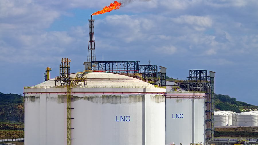 <div class="paragraphs"><p>Representative image of large LNG (Liquefied natural gas) tanks at LNG regasification terminal, with gas flare stack</p></div>