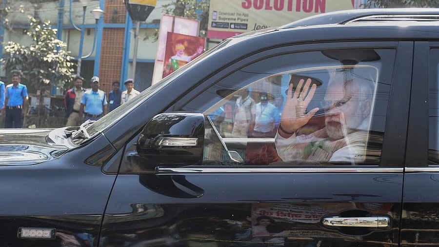 <div class="paragraphs"><p>Prime Minister Narendra Modi arrives for a rally in Krishnanagar.</p></div>